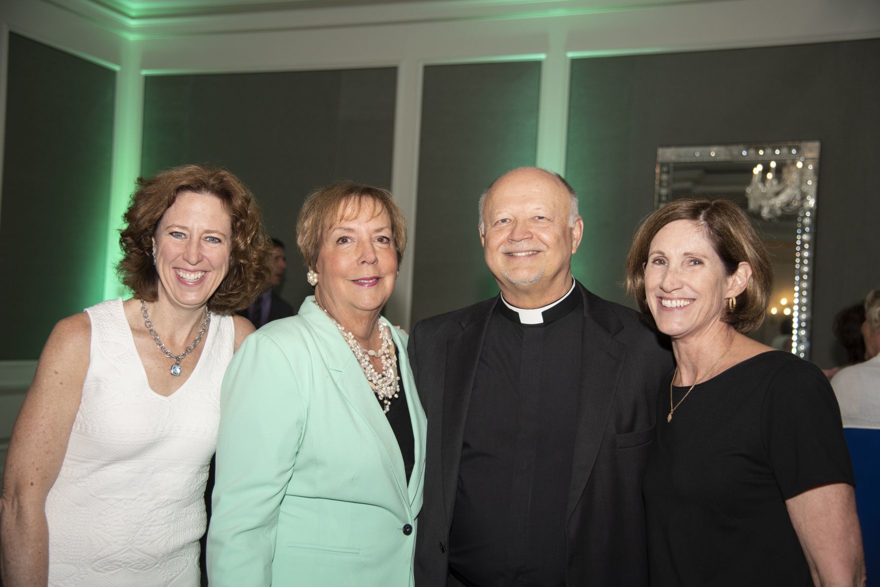 Chris Wheeland, Mary Dee Schmidt, Msgr. Michael Turek, Chris Mathias